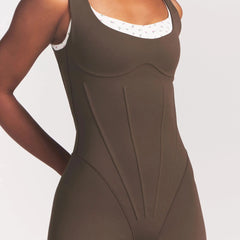 NikeSKIMS MATTE CORSET 2" ONE PIECE | DARK SEPIA ON A MODEL