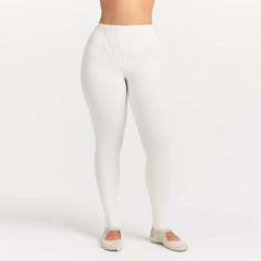 NikeSKIMS MATTE HIGH WAIST CORSET 26" LEGGING | IVORY ON A MODEL