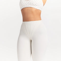 NikeSKIMS MATTE HIGH WAIST CORSET 26" LEGGING | IVORY ON A MODEL