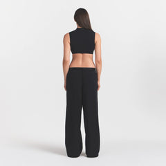 NikeSKIMS STRETCH NYLON OVERSIZED PANT | OBSIDIAN ON A MODEL VIEW @ | FOCUS: 0.0, 1.0, 0.9