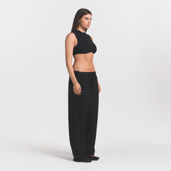 NikeSKIMS STRETCH NYLON OVERSIZED PANT | OBSIDIAN ON A MODEL VIEW @ | FOCUS: 0.0, 1.0, 0.9