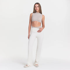 NikeSKIMS MATTE SLIM FLARE LEGGING | IVORY ON A MODEL