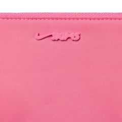 NikeSKIMS ACCESSORIES CLIPPABLE POUCH | LIGHT FLAMINGOLAYS FLAT ON A WHITE BACKGROUND
