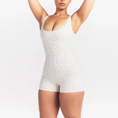 NikeSKIMS MATTE CORSET 2" ONE PIECE | DITSY FLORAL PRINT ON A MODEL @ | FOCUS: 0.0, 1.0, 0.9