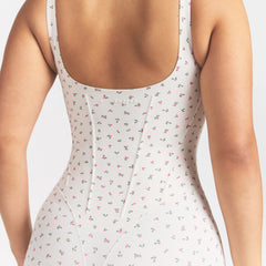 NikeSKIMS MATTE CORSET 2" ONE PIECE | DITSY FLORAL PRINT ON A MODEL @ | FOCUS: 0.0, 1.0, 0.9