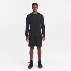 SKIMS COTTON MENS CLASSIC LONG SLEEVE T-SHIRT | ONYX ON A MODEL FRONT VIEW