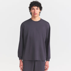 HEAVYWEIGHT COTTON MENS RELAXED LONG SLEEVE T-SHIRT | RAVEN ON A MODEL SIDE VIEW @ | FOCUS: 0.0, 1.0, 0.9