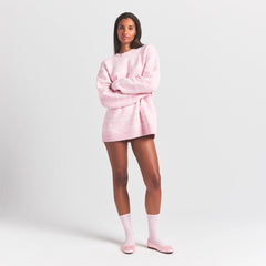 COZY LIGHT CREWNECK PULLOVER | BABY PINK HEART FAIR ISLE ON A MODEL FRONT VIEW @ | FOCUS: 0.0, 1.0, 0.9