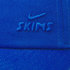 NikeSKIMS ACCESSORIES CLUB CAP | COBALT FLAT ON A WHITE BACKGROUND