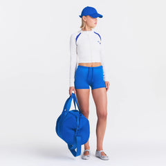 NikeSKIMS ACCESSORIES CLUB CAP | COBALT ON A MODEL FRONT VIEW @ | FOCUS: 0.0, 1.0, 0.9