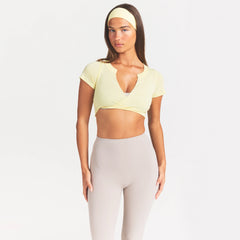 NikeSKIMS ACCESSORIES HEADBAND | BICYCLE YELLOW ON A MODEL SIDE VIEW @ | FOCUS: 0.0, 1.0, 0.9