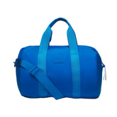 NikeSKIMS ACCESSORIES PUFFER GYM BAG | COBALT & LAYS FLAT ON A WHITE BACKGROUND | FLT
