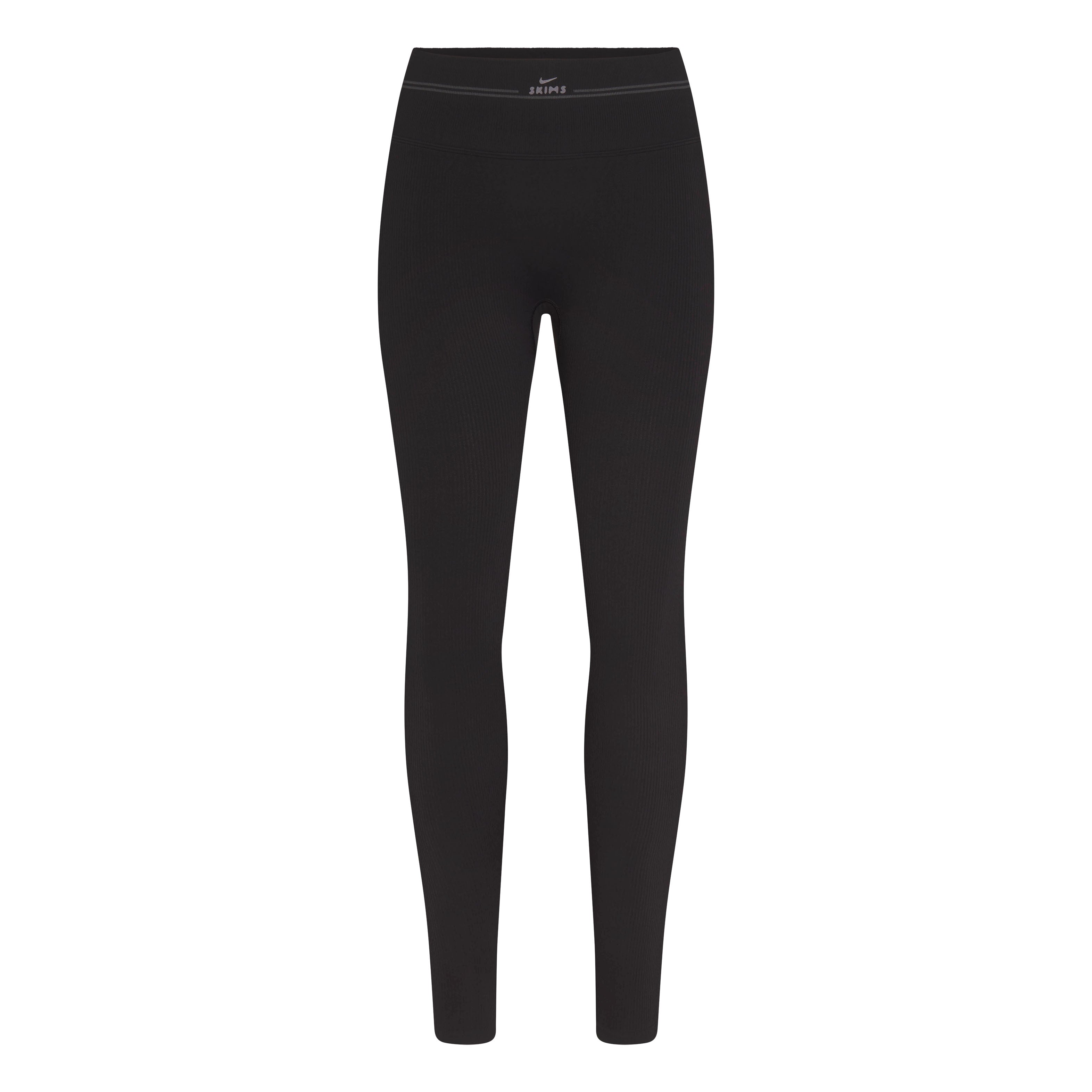 NikeSKIMS RIBBED SEAMLESS 26" LEGGING | OBSIDIAN FLAT ON A WHITE BACKGROUND | FLT