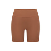 NikeSKIMS MATTE 5" BIKER SHORT |CAROB BROWN FLAT ON A WHITE BACKGROUND | FLT