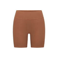 NikeSKIMS MATTE 5" BIKER SHORT |CAROB BROWN FLAT ON A WHITE BACKGROUND | FLT
