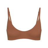 NikeSKIMS MATTE MICRO SCOOP BRA | CAROB BROWN FLAT ON A WHITE BACKGROUND | FLT