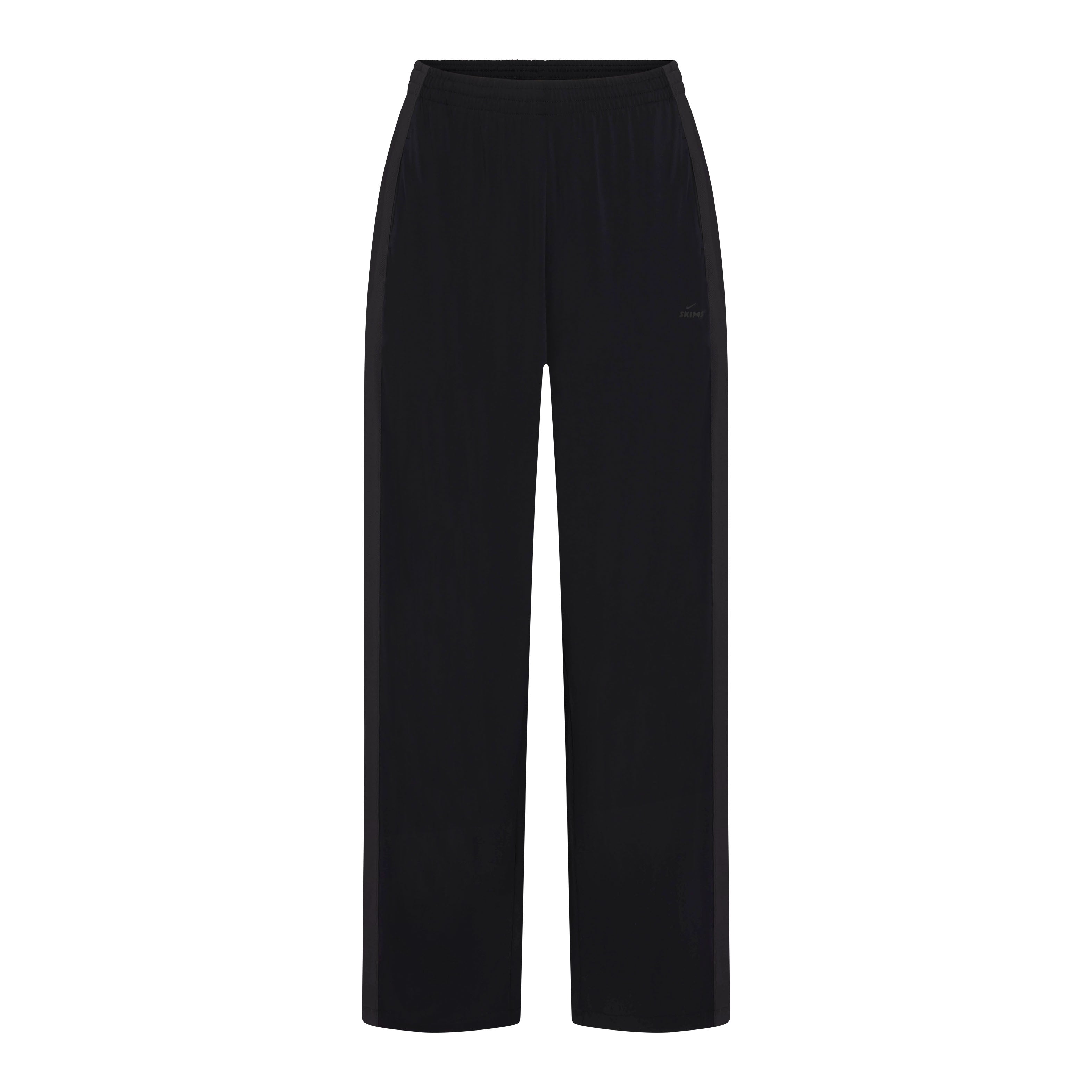 NikeSKIMS STRETCH KNIT WIDE LEG PANT | NSKM OBSIDIAN/NSKM IGNEOUS FLAT ON A WHITE BACKGROUND | FLT