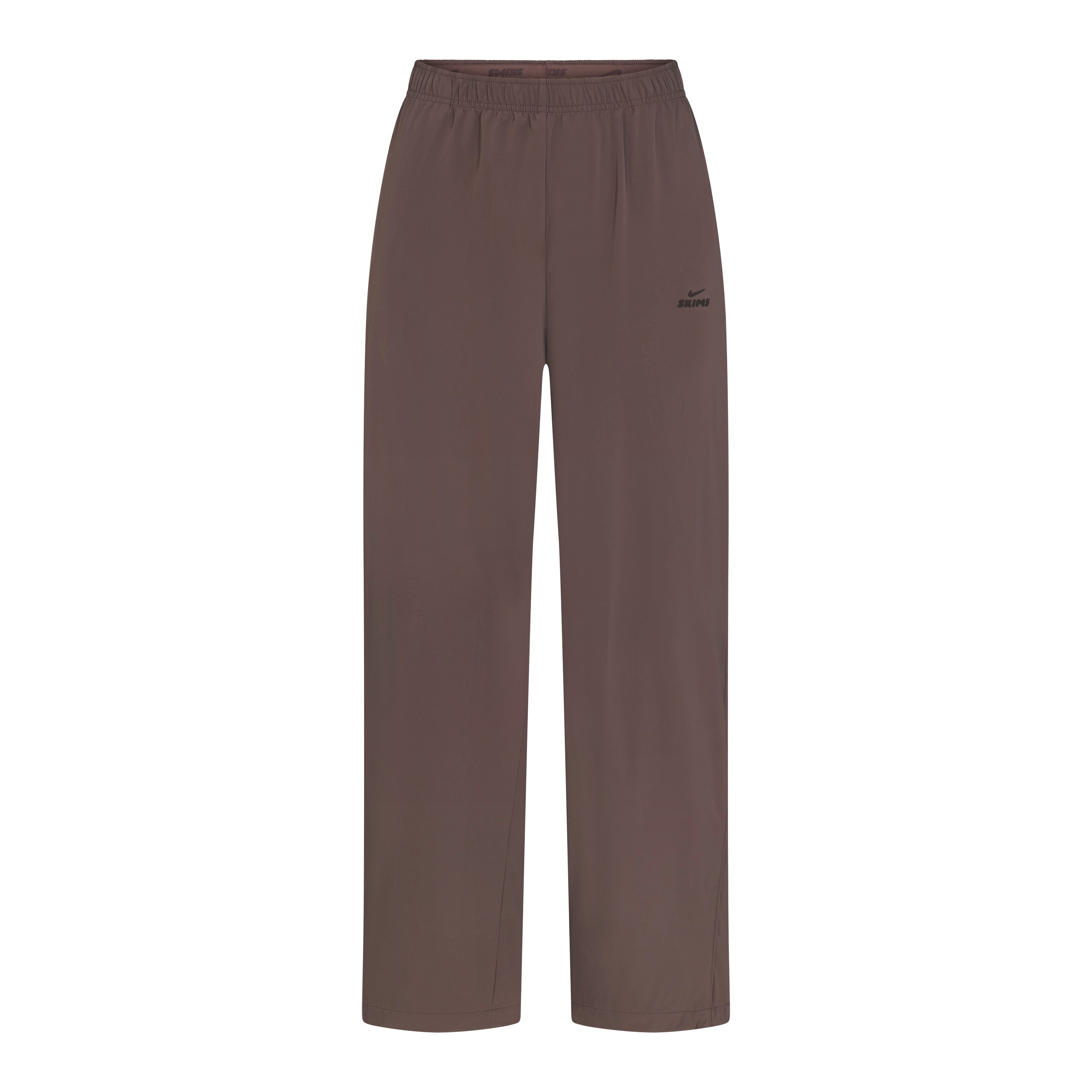 NikeSKIMS STRETCH NYLON OVERSIZED PANT | NSKM RESIN FLAT ON A WHITE BACKGROUND | FLT