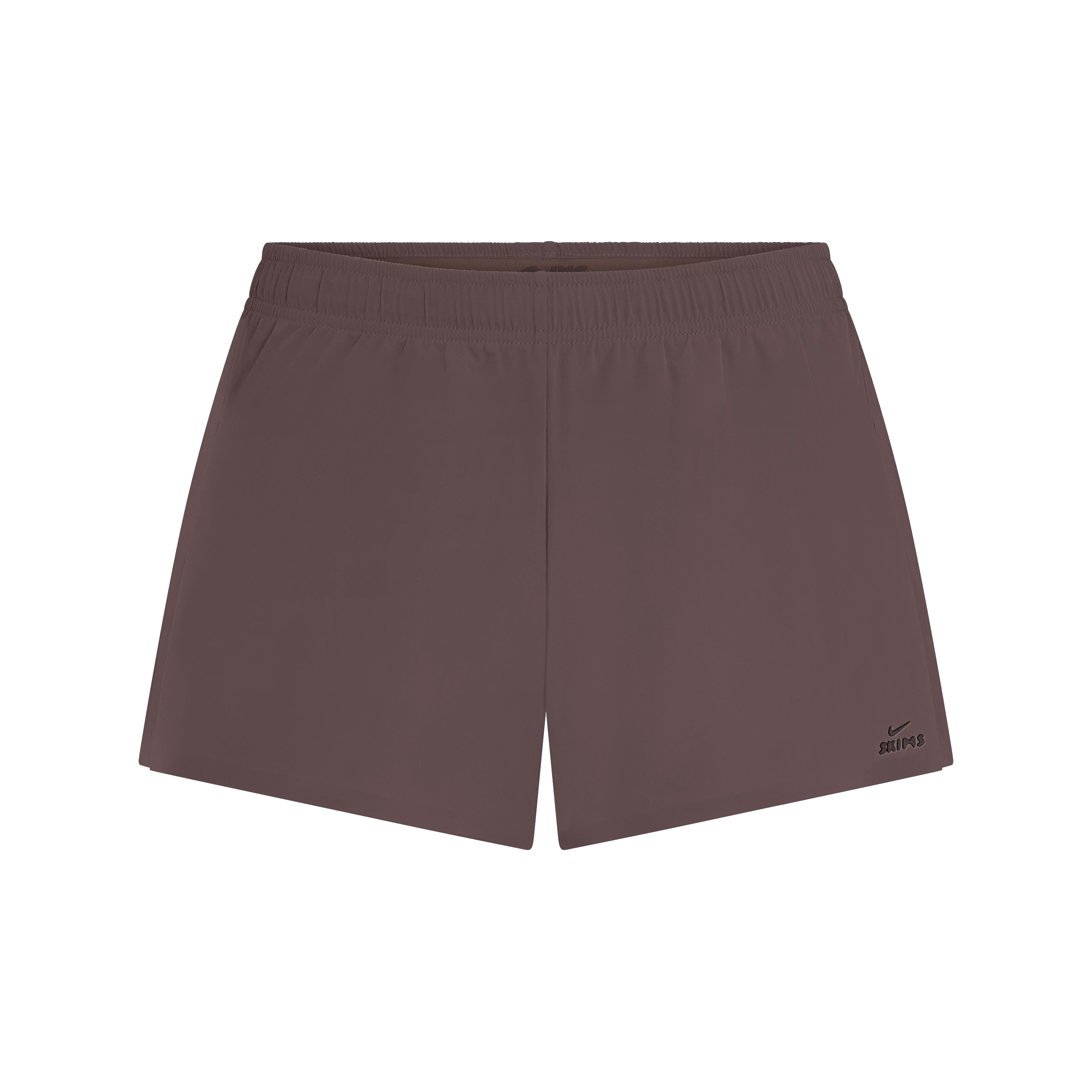 NikeSKIMS STRETCH NYLON RUNNER SHORT | NSKM RESIN FLAT ON A WHITE BACKGROUND | FLT