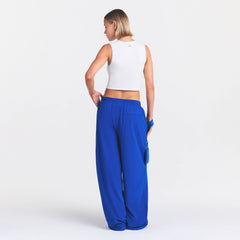 NikeSKIMS STRETCH NYLON OVERSIZED PANT | COBALT ON A MODEL FRONT VIEW @ | FOCUS: 0.0, 1.0, 0.9
