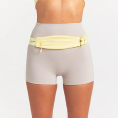 NikeSKIMS STUDIO STRETCH 3" SHORT | LINEN ON A MODEL SIDE VIEW @ | FOCUS: 0.0, 1.0, 0.9