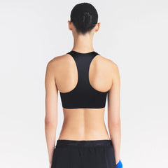 NikeSKIMS SATIN SHINE RACER BACK ZIP FRONT BRA | OBSIDIAN ON A MODEL SIDE VIEW @ | FOCUS: 0.0, 1.0, 0.9