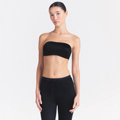 NikeSKIMS SATIN SHINE BANDEAU BRA | OBSIDIAN ON A MODEL SIDE VIEW @ | FOCUS: 0.0, 1.0, 0.9