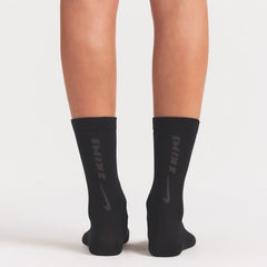 NikeSKIMS ACCESSORIES RIFT CREW SOCK | OBSIDIAN/(BOULDER) ON A MODEL SIDE VIEW @ | FOCUS: 0.0, 1.0, 0.9