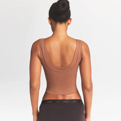 NikeSKIMS MATTE DOUBLE STRAP SCOOP TANK | CAROB BROWN ON A MODEL SIDE VIEW @ | FOCUS: 0.0, 1.0, 0.9