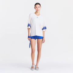 NikeSKIMS STRETCH KNIT OVERSIZED V-NECK TOP | IVORY ON A MODEL FRONT VIEW @ | FOCUS: 0.0, 1.0, 0.9