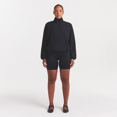 NikeSKIMS STRETCH NYLON OVERSIZED TRACK JACKET | OBSIDIAN ON A MODEL FRONT VIEW @ | FOCUS: 0.0, 1.0, 0.9