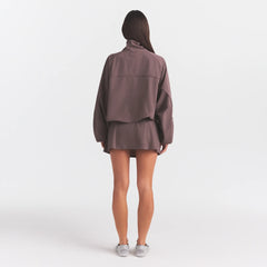NikeSKIMS STRETCH NYLON OVERSIZED JACKET | RESIN ON A MODEL FRONT VIEW @ | FOCUS: 0.0, 1.0, 0.9