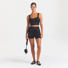 NikeSKIMS SATIN SHINE PANELED SCOOP TANK | OBSIDIAN ON A MODEL FRONT VIEW @ | FOCUS: 0.0, 1.0, 0.9