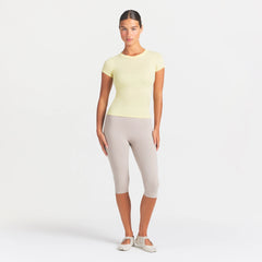 NikeSKIMS PERFORMANCE COTTON BLEND SHORT SLEEVE TOP | BICYCLE YELLOW ON A MODEL FRONT VIEW @ | FOCUS: 0.0, 1.0, 0.9