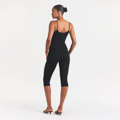 SMOOTH LAYERS CAPRI CATSUIT | OBSIDIAN ON A MODEL FRONT VIEW @ | FOCUS: 0.0, 1.0, 0.9
