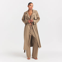 WOVEN COTTON OVERSIZED TRENCH COAT | DESERT ON A MODEL FRONT VIEW @ | FOCUS: 0.0, 1.0, 0.9