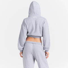 COTTON FLEECE CROPPED HOODIE | HEATHER GREY ON A MODEL SIDE VIEW @ | FOCUS: 0.0, 1.0, 0.9