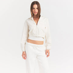 WOVEN COTTON CROPPED ZIP UP JACKET | EGRET ON A MODEL SIDE VIEW @ | FOCUS: 0.0, 1.0, 0.9