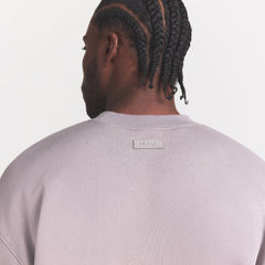 FLEECE LOUNGE MENS RELAXED HIGH CREWNECK | SHADOW ON A MODEL SIDE VIEW @ | FOCUS: 0.0, 1.0, 0.9