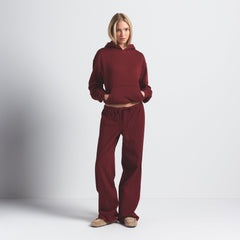 COTTON FLEECE CLASSIC HOODIE | MERLOT ON A MODEL FRONT VIEW @ | FOCUS: 0.0, 1.0, 0.9