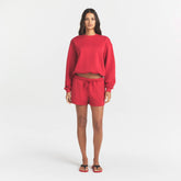 COTTON FLEECE CLASSIC CREWNECK | WASHED RED ON A MODEL FRONT VIEW @ | FOCUS: 0.0, 1.0, 0.9