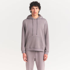 FLEECE LOUNGE MENS RELAXED HOODIE | SHADOW ON A MODEL SIDE VIEW @ | FOCUS: 0.0, 1.0, 0.9