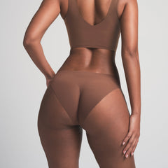 NAKED BIKINI WORN BY A MODEL IN BACK VIEW