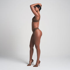 FITS EVERYBODY THONG | JASPER ON A MODEL SIDE VIEW | FOCUS: 0.0, 1.0, 0.9