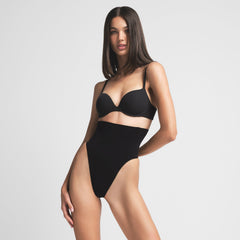 CORE CONTROL HIGH-WAISTED THONG | ONYX ON A MODEL FRONT VIEW | FOCUS: 0.0, 1.0, 0.9