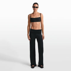 NikeSKIMS STRETCH KNIT FOLDOVER WIDE LEG PANT | OBSIDIAN ON A MODEL FRONT VIEW @ | FOCUS: 0.0, 1.0, 0.9