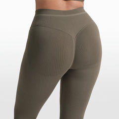 NikeSKIMS RIBBED SEAMLESS 26" LEGGING | DUSTY OAKMOSS/DUNE ON A MODEL FRONT VIEW @ | FOCUS: 0.0, 1.0, 0.9