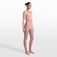NikeSKIMS MATTE V-LINE STIRRUP LEGGING | HIMALAYAN ON A MODEL FRONT VIEW @ | FOCUS: 0.0, 1.0, 0.9