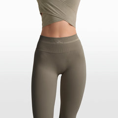 NikeSKIMS RIBBED SEAMLESS 34" STRAIGHT LEGGING | DUSTY OAKMOSS/DUNE ON A MODEL FRONT VIEW @ | FOCUS: 0.0, 1.0, 0.9