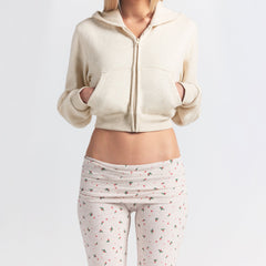 COTTON JERSEY FOLDOVER PANT | OATMEAL HEATHER HOLLY PRINT ON A MODEL SIDE VIEW @ | FOCUS: 0.0, 1.0, 0.9
